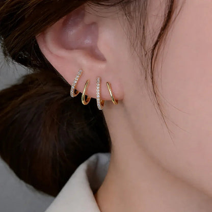 Yasmin | Boucles d’oreilles à griffes avec zircons étincelants