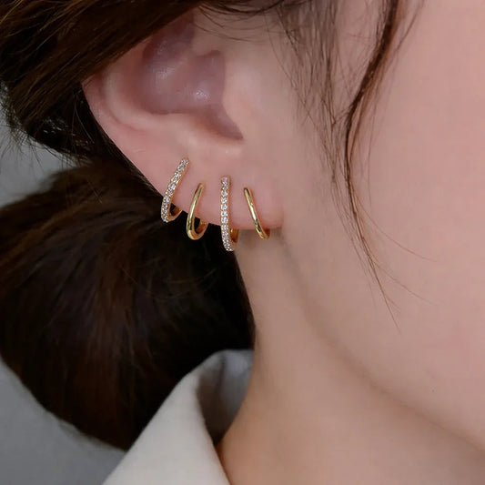 Yasmin | Boucles d’oreilles à griffes avec zircons étincelants